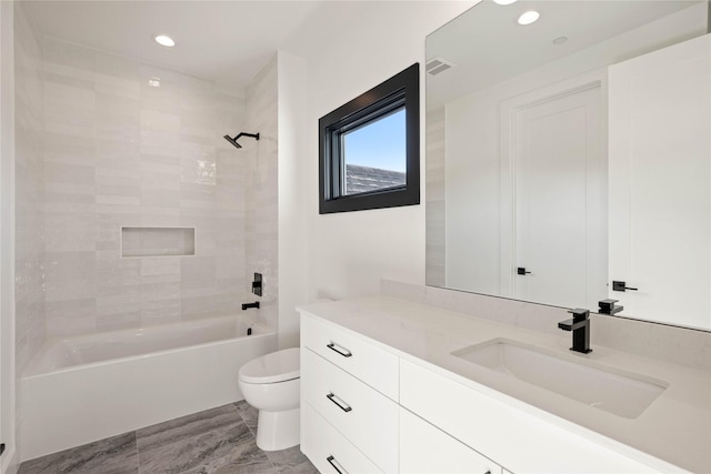 full bathroom with visible vents, toilet, recessed lighting, shower / bath combination, and vanity