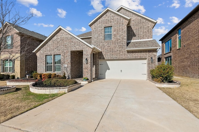 view of front of home with driveway, a shingled roof, an attached garage, a front lawn, and brick siding