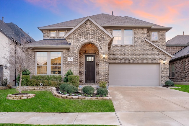 view of front of house with a garage