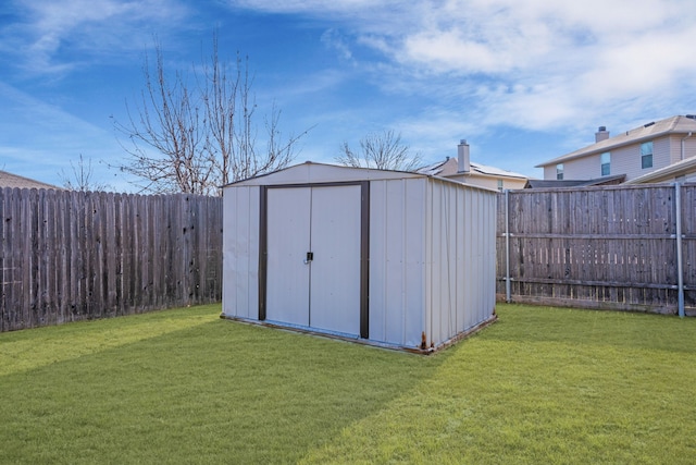 view of outdoor structure with a yard