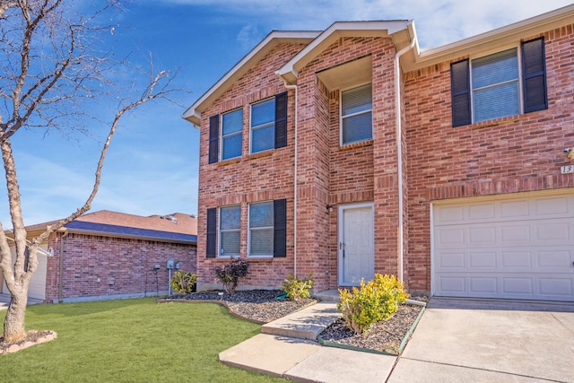 view of front of house featuring a garage and a front yard