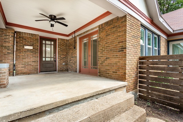 doorway to property featuring a patio, ceiling fan, and french doors