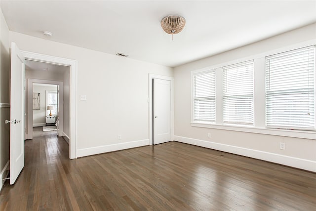 interior space with dark hardwood / wood-style floors