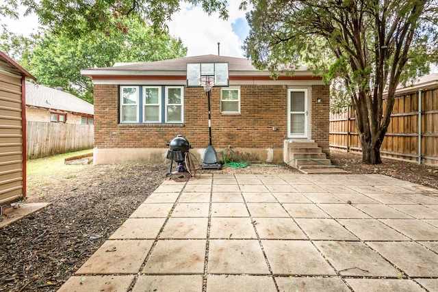 rear view of house with a patio area