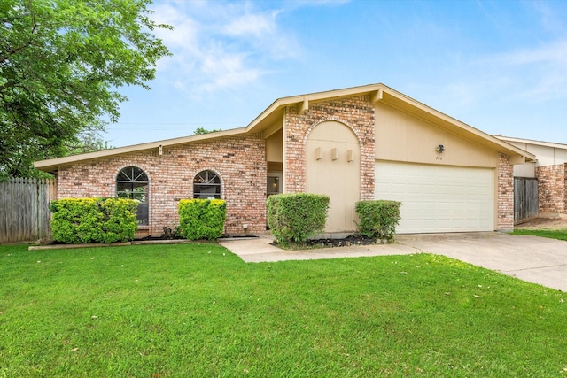 single story home with a garage and a front yard