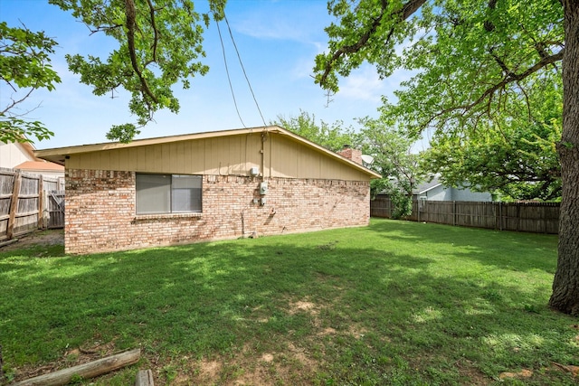 exterior space with a lawn