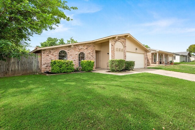 back of property featuring a lawn and a patio area