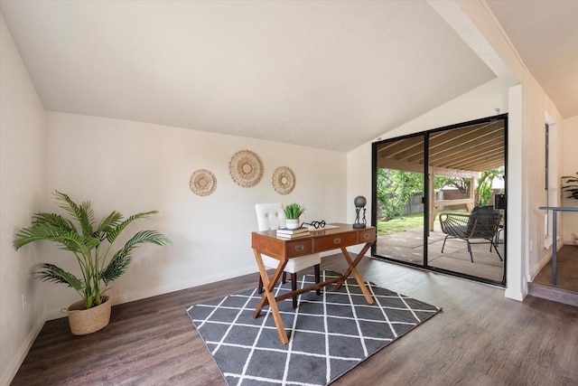 home office featuring vaulted ceiling and dark wood-type flooring