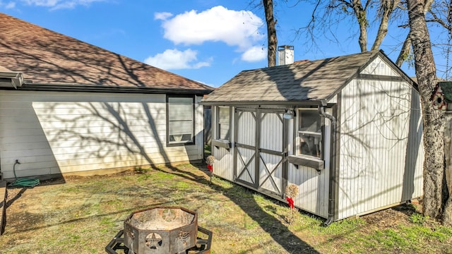 view of outdoor structure with a yard