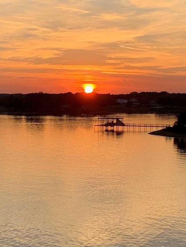 property view of water featuring a boat dock