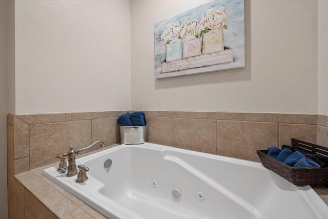 bathroom with a relaxing tiled tub