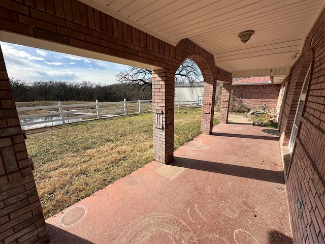 view of patio / terrace featuring a water view