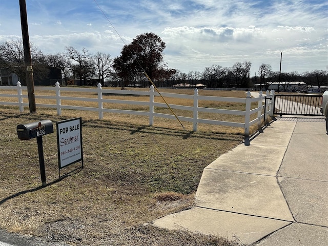 exterior space with a rural view