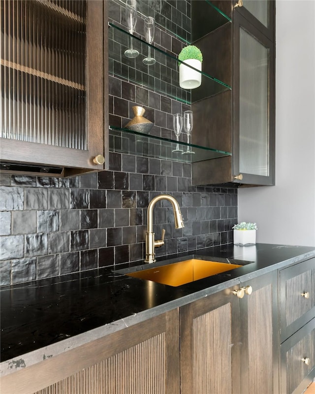 kitchen with backsplash and sink