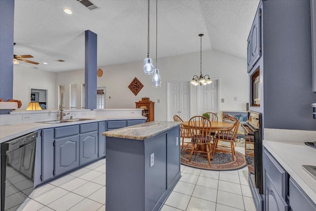 kitchen with pendant lighting, dishwasher, a center island, light tile patterned flooring, and vaulted ceiling