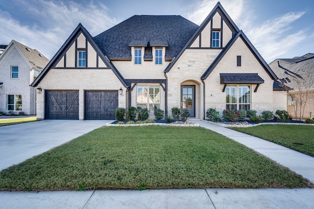 tudor house with a garage and a front lawn