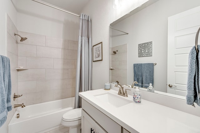 full bathroom with shower / tub combo, vanity, tile patterned floors, and toilet