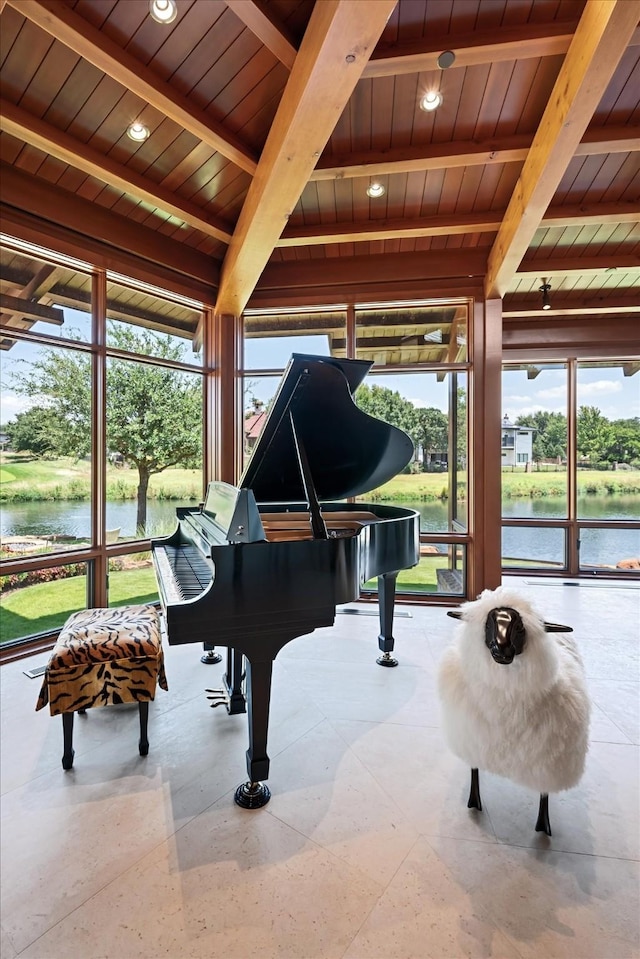 miscellaneous room featuring wood ceiling, beam ceiling, and a water view