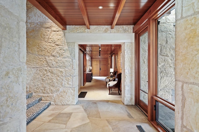 corridor with beamed ceiling and wooden ceiling