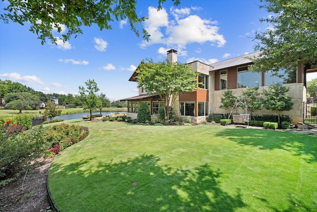 view of yard with a water view