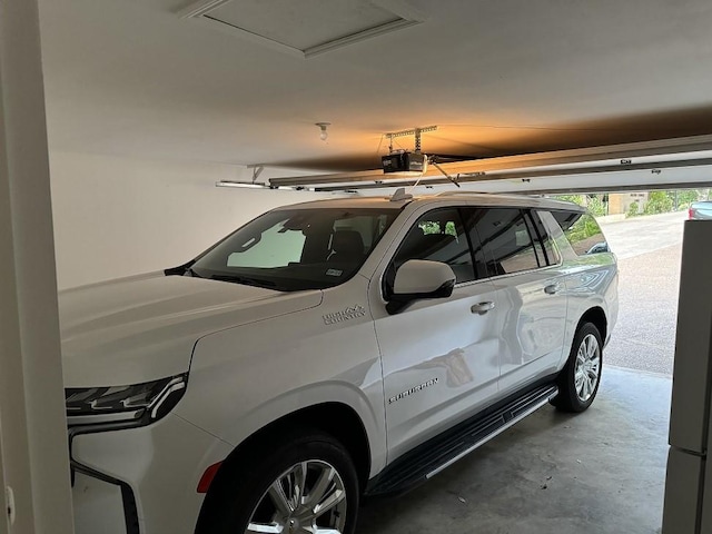 garage featuring a garage door opener