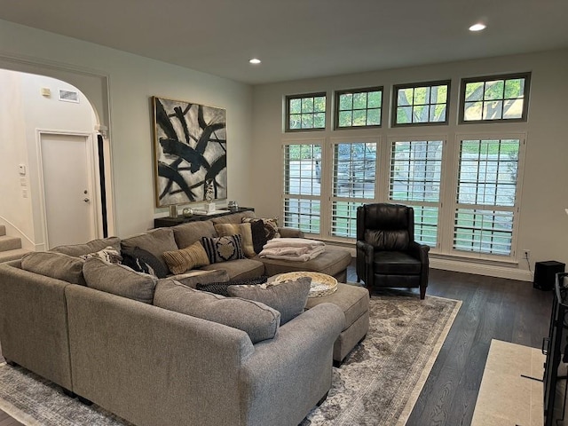 living room with dark hardwood / wood-style floors