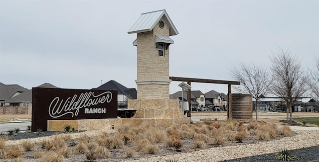 view of community sign