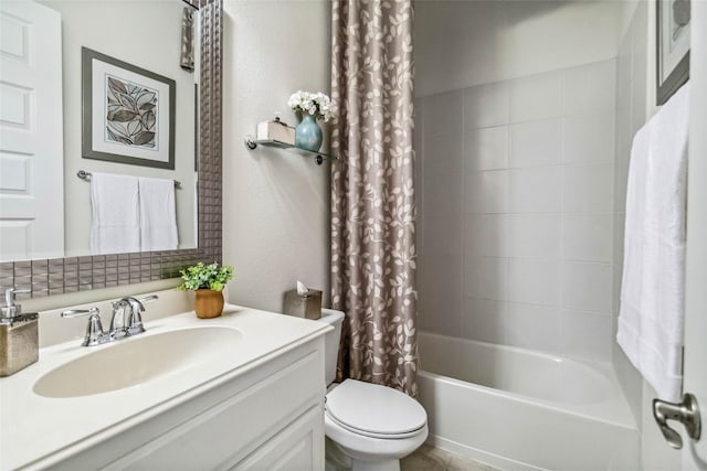 full bathroom with shower / tub combo with curtain, vanity, and toilet