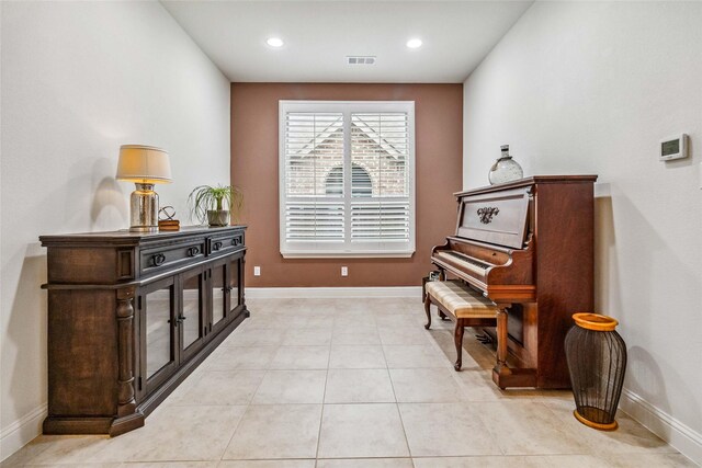 sitting room with light tile patterned floors