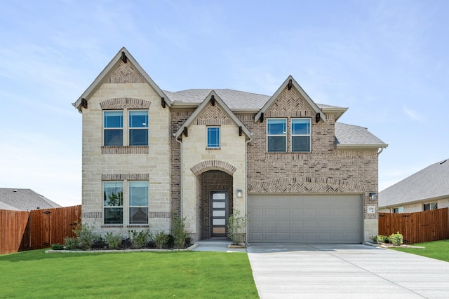 3350 Blazing Star Dr, Crandall, TX 75114 - french provincial home featuring concrete driveway, stone siding, a garage, brick siding, and roof with shingles