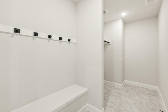 3350 Blazing Star Dr, Crandall, TX 75114 - mudroom featuring baseboards, recessed lighting, and light marble finish floors