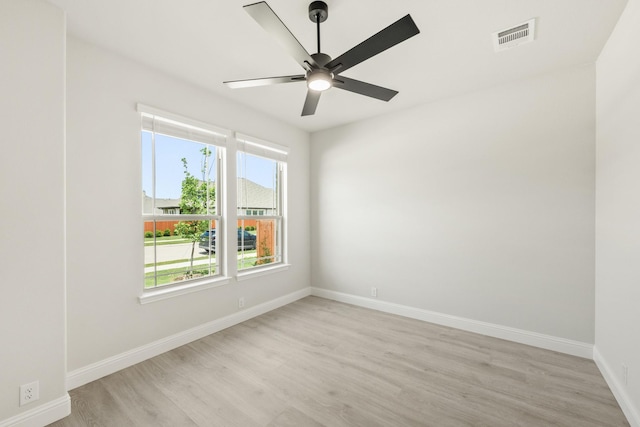 3350 Blazing Star Dr, Crandall, TX 75114 - unfurnished room featuring light wood finished floors, a ceiling fan, and baseboards
