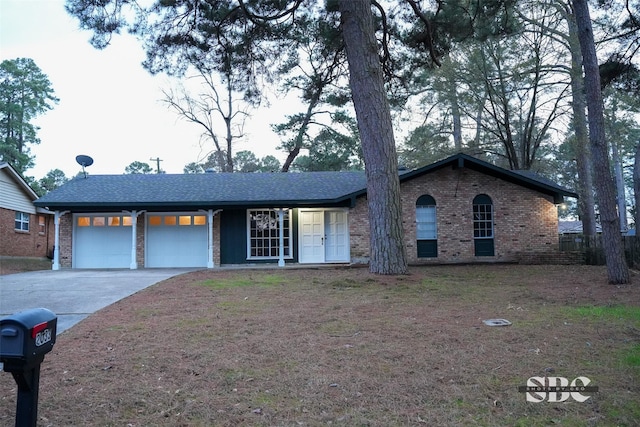 single story home with a garage