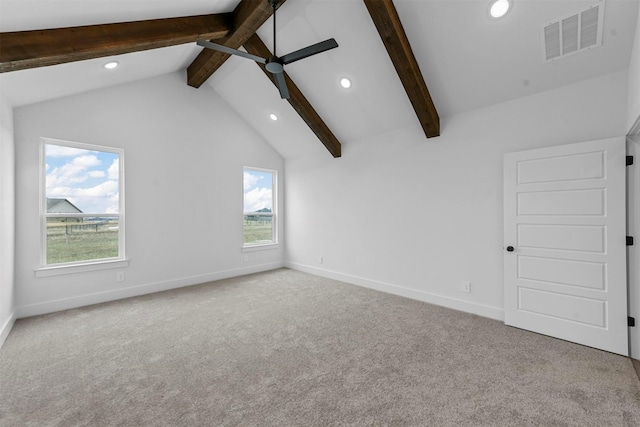 interior space featuring vaulted ceiling with beams and ceiling fan