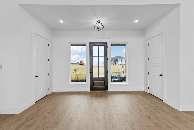 entrance foyer featuring light hardwood / wood-style floors