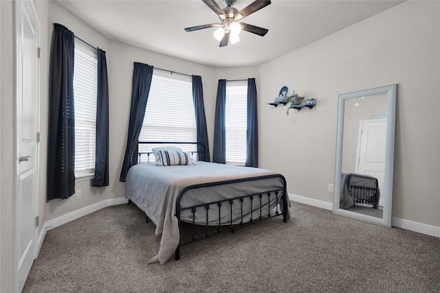 bedroom with ceiling fan and carpet