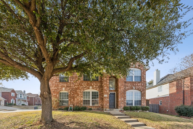 view of front of house with a front lawn