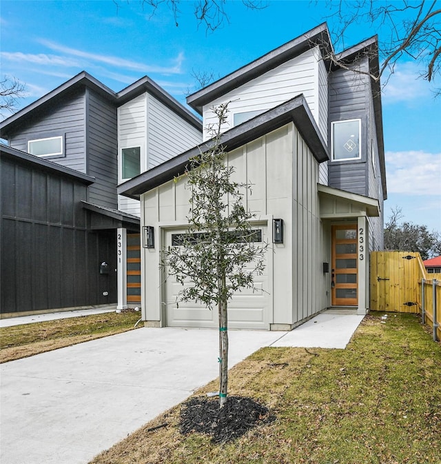 contemporary house with a front lawn