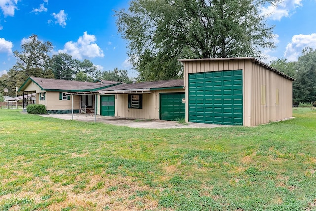 164 Ruth, Haughton, LA 71037 - exterior space featuring a garage, a patio area, and a lawn