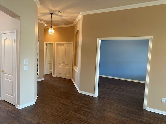 hallway featuring crown molding and dark wood-type flooring