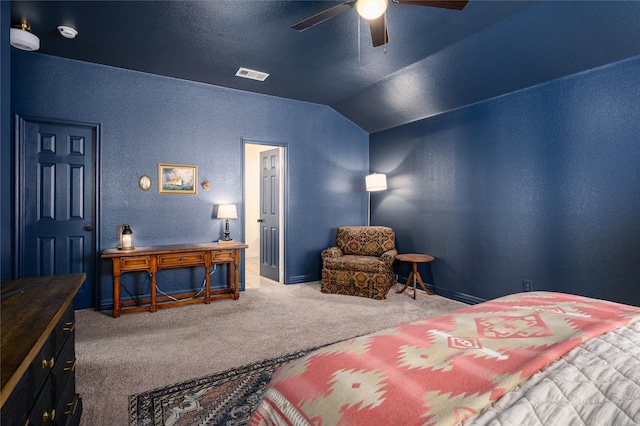 carpeted bedroom featuring vaulted ceiling and ceiling fan