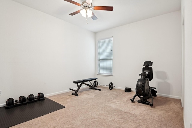 workout area with light colored carpet and ceiling fan