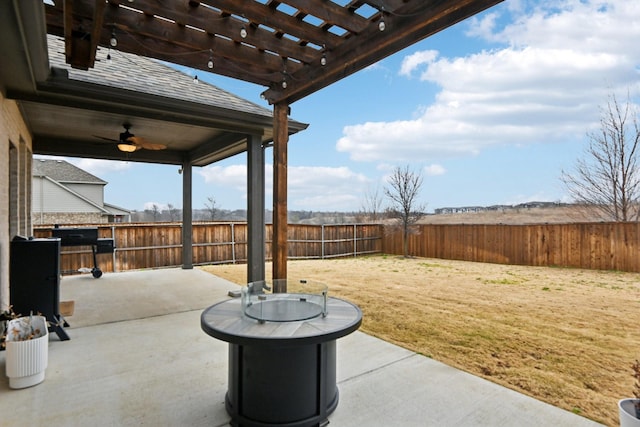 view of patio featuring ceiling fan and a pergola