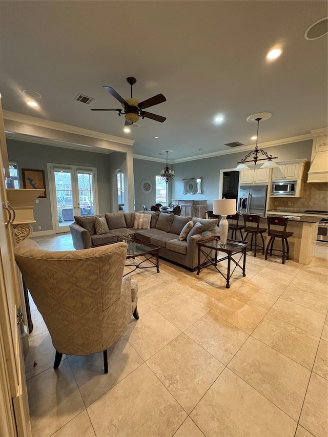 living room with light tile patterned floors, visible vents, recessed lighting, ornamental molding, and french doors