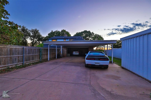 exterior space with a carport