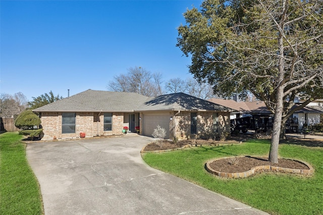 single story home featuring a garage and a front lawn