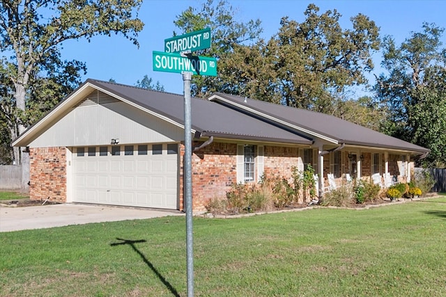 single story home featuring a garage and a front lawn