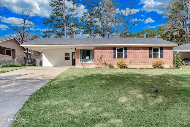 ranch-style house featuring a carport and a front yard