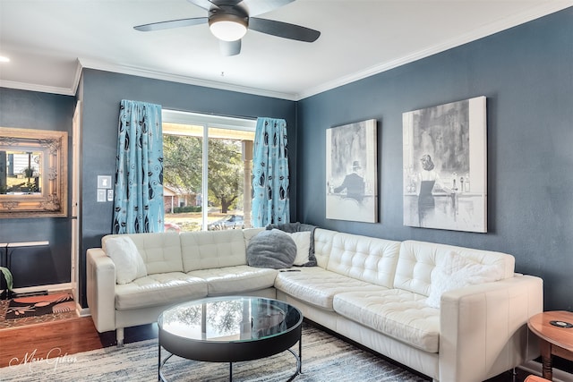 living room featuring crown molding, hardwood / wood-style floors, and ceiling fan