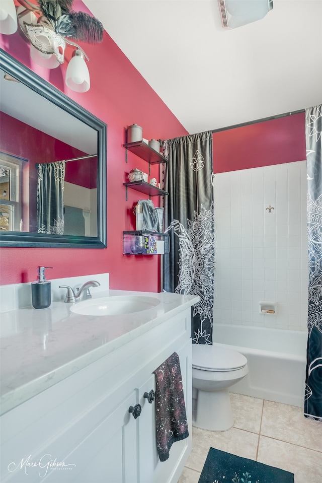 full bathroom featuring shower / bathtub combination with curtain, vanity, tile patterned floors, and toilet